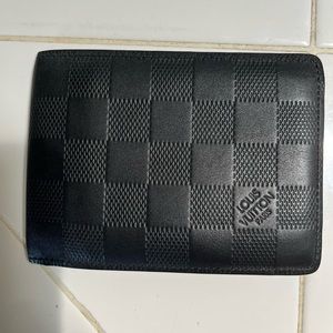 Selling Mens all black Louis Wallet in excellent condition. Slim wallet